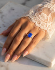 Inel de Logodnă Raphael din Aur 18k cu Safir Creat în Laborator Emerald Cut 8x10 mm din Platina - Castelo.ro